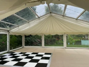 Large Marquee with checkerboard flooring.