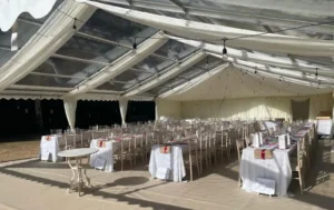 Formal wedding set up in large premium marquee.